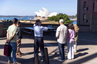 Half Day Sydney Sightseeing Tour - The Rocks & Bondi Beach - Walking The Rocks for colonial lanes, convict-era clues, and Aboriginal heritage