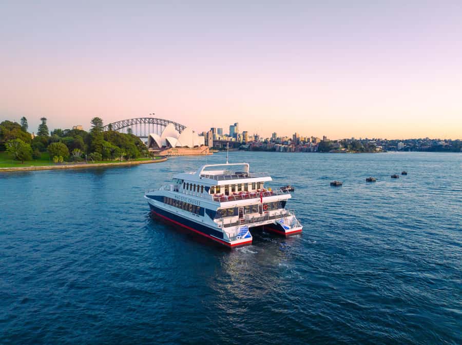 Sydney Harbour Sightseeing Cruise with Live Commentary - Under the Harbour Bridge and past the Opera House: the views people remember