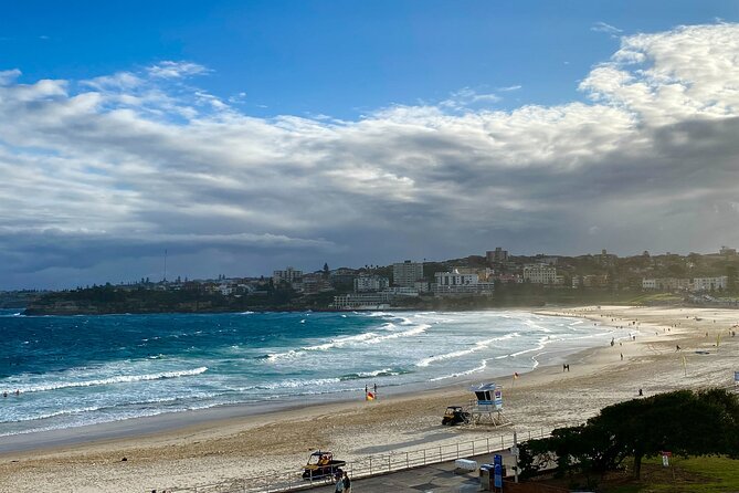 Sydney: PRIVATE City Highlights & Ocean Front Luxe Tour (4h) - Bondi Beach stroll: sand, surfers, and the Surf Life Saving connection